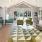 a club room with a green rug